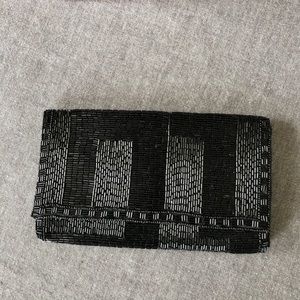 K.C. Malhan glitzy black clutch 8.5”x 5”